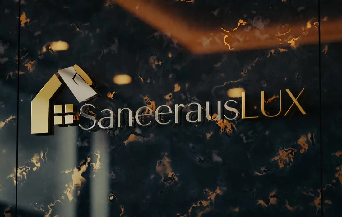 SaneerausLux-logo kultaisena marmoripinnalla