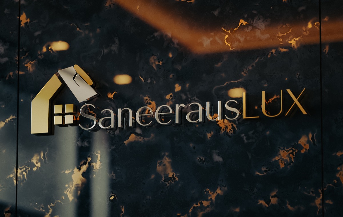 SaneerausLux-logo kultaisena marmoripinnalla
